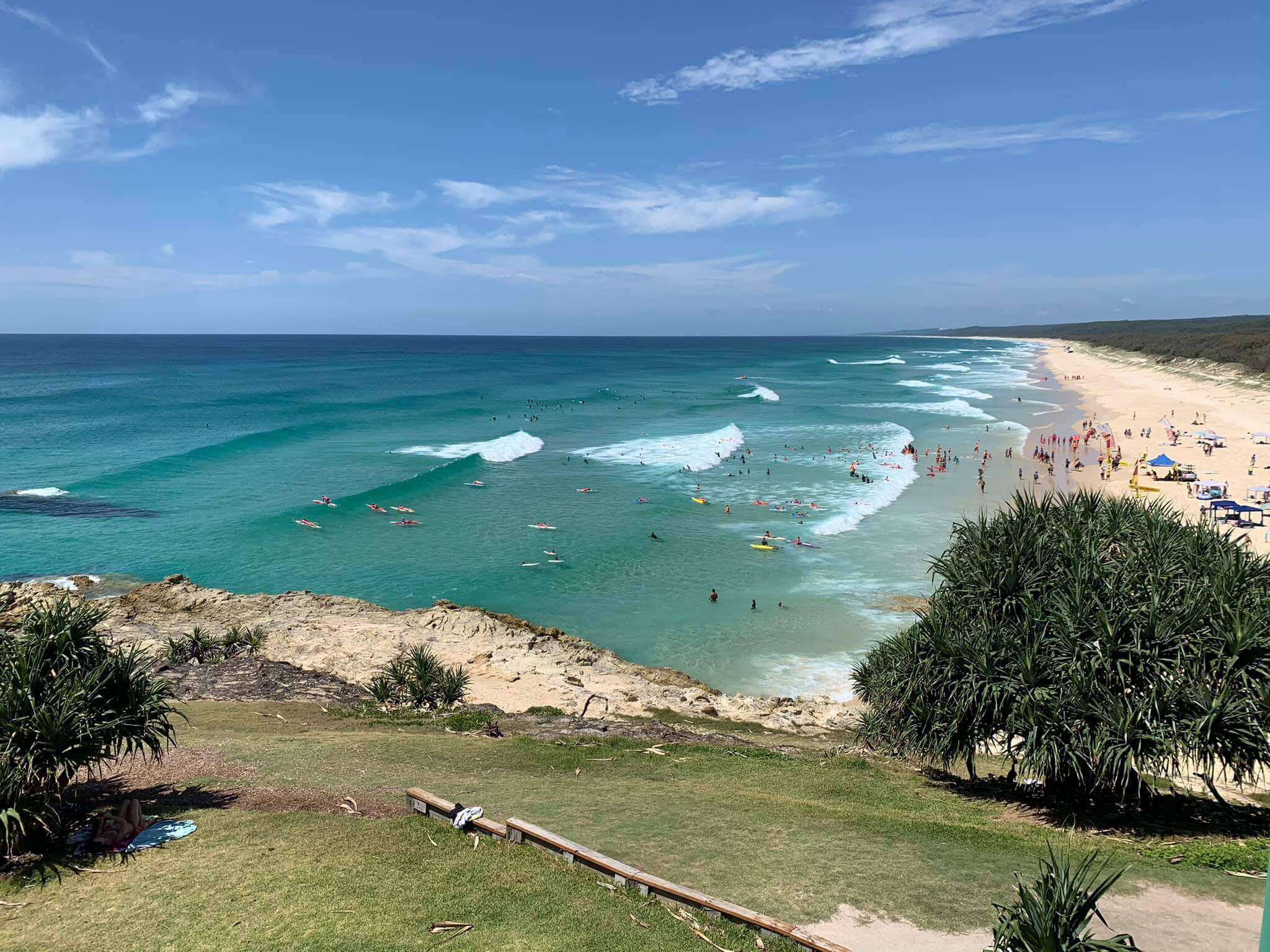 aerial view of nippers junior activities at point lookout surf lifesaving club