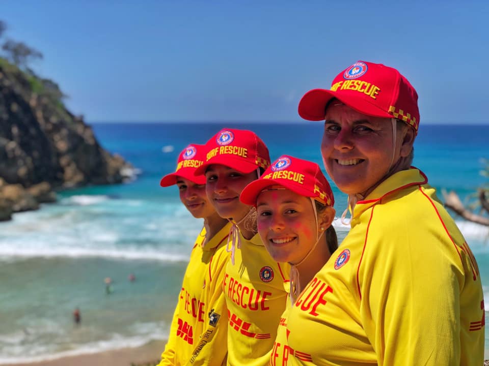 man and woman lifesavers patrolling beach